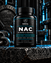 Anvil Nutrition NAC bottle, 600 mg N-Acetyl L-Cysteine per capsule and 60 capsules, standing on an anvil in front of weight plates.